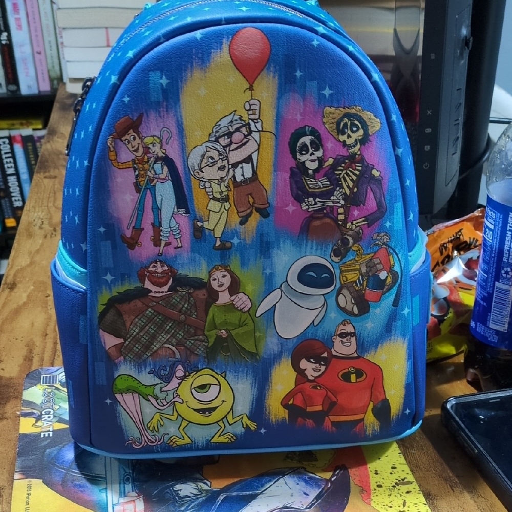 Loungefly Blue Mini Bag with Colorful Character Design